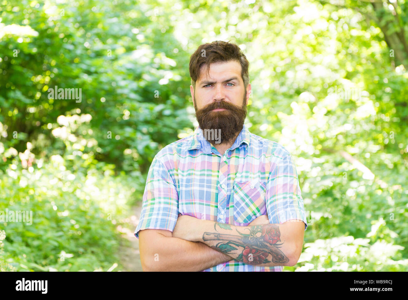 Eco lifestyle. United with environment. Handsome lumberjack. Man