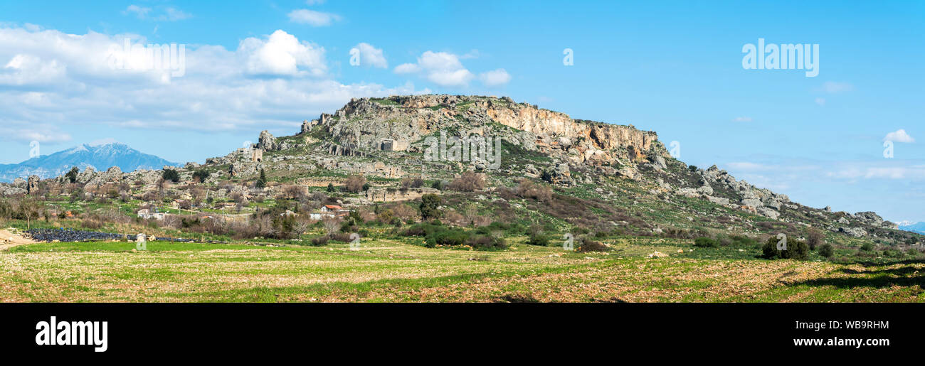 Rocky plateau with scattered ruins of Silyon ancient city in Antalya province of Turkey. Stock Photo