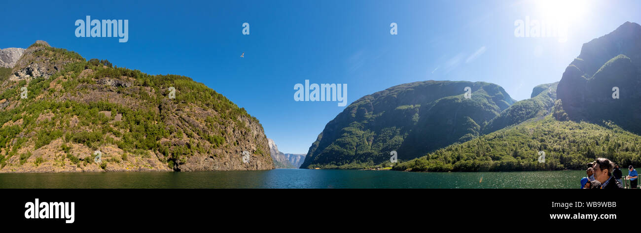 Fjord, Nærøyfjord, rock faces, mountains, blue sky, sunshine, Styvi, Sogn og Fjordane, Norway, Scandinavia, Europe, NOR, travel, tourism, destination, Stock Photo