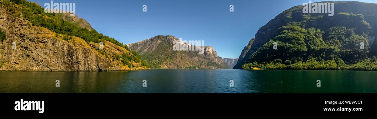 Fjord, Nærøyfjord, rock faces, mountains, blue sky, Styvi, Sogn og Fjordane, Norway, Scandinavia, Europe, NO, travel, tourism, destination, sightseein Stock Photo