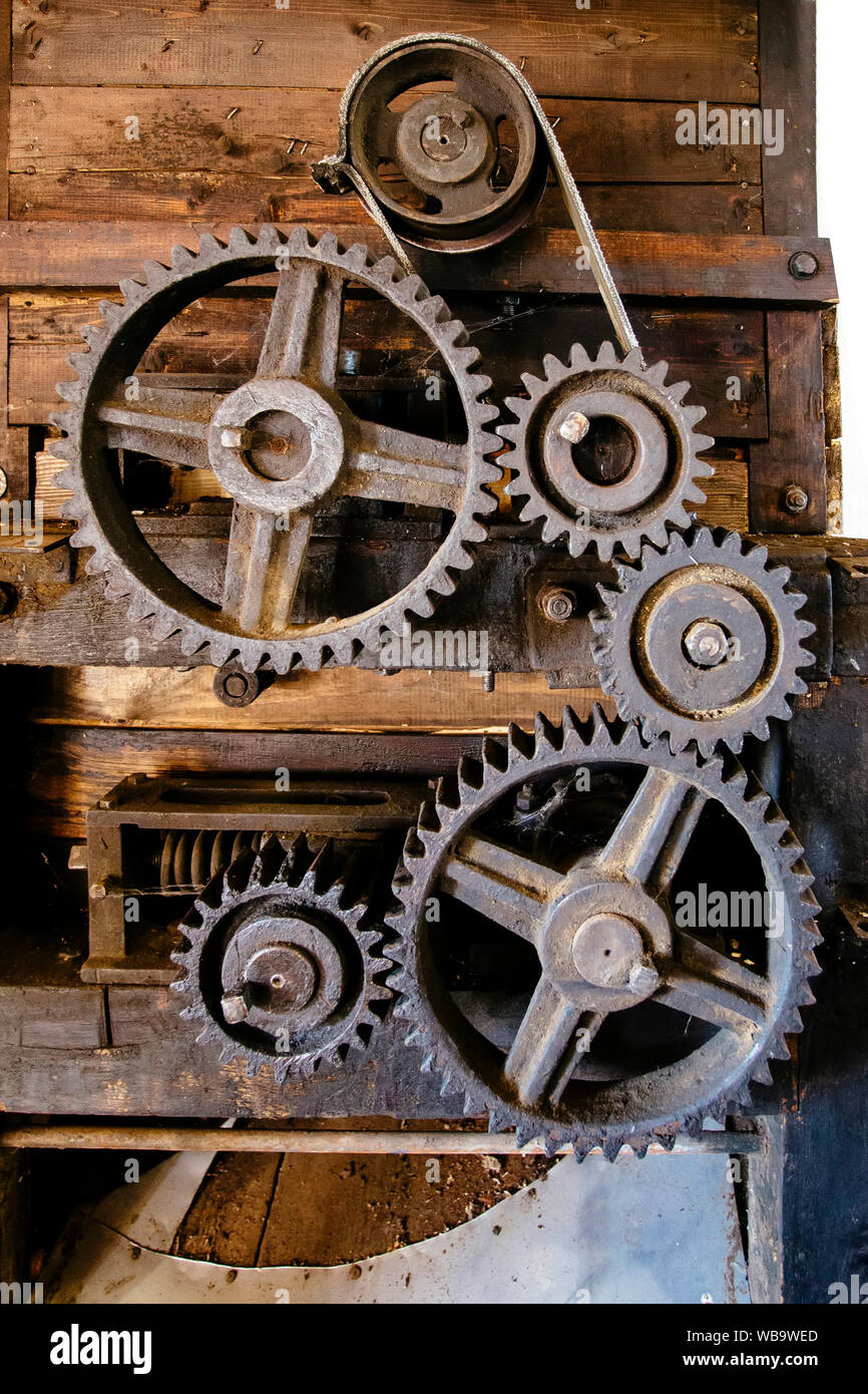 Old mechanism. Old gears and pulleys with belt Stock Photo Alamy