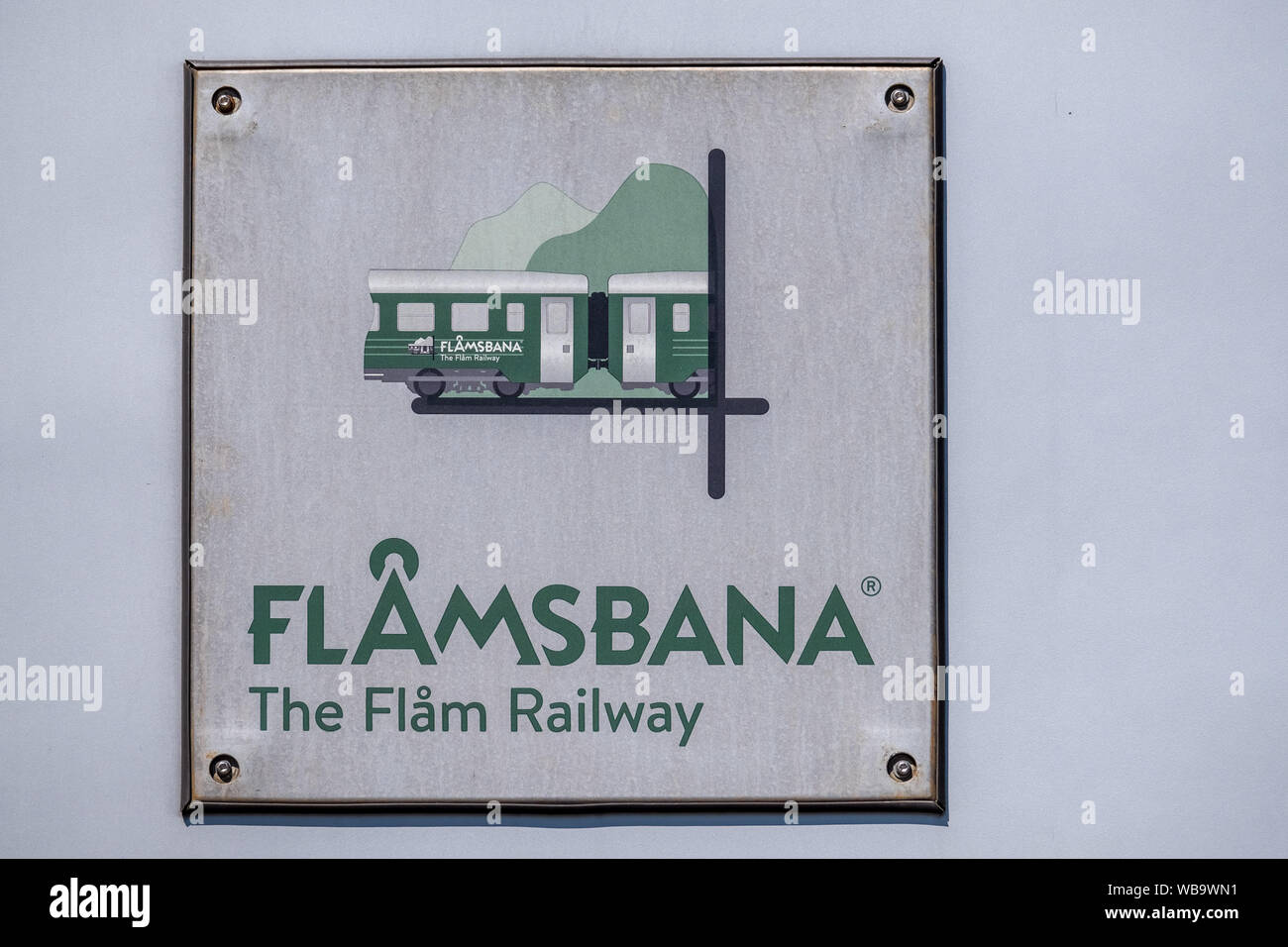 Travel with the Flambahn, Eisenbahreise, White sign with green lettering Flåmsbana, The Flam Railway, Sogn og Fjordane, Norway, Scandinavia,, Adventur Stock Photo