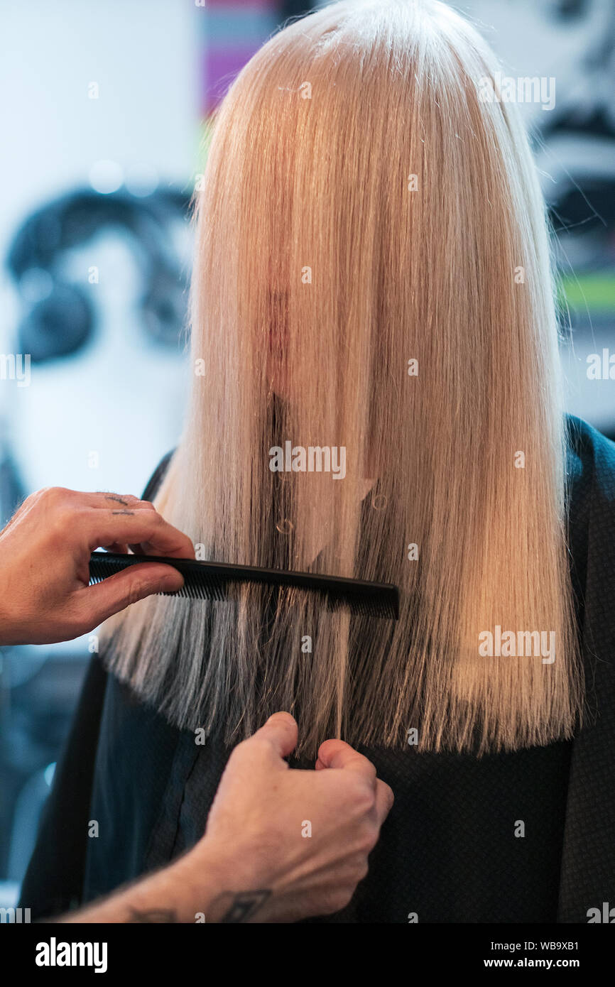 Hairdresser Trimming Hair With Scissors Stock Photo 265134997 Alamy