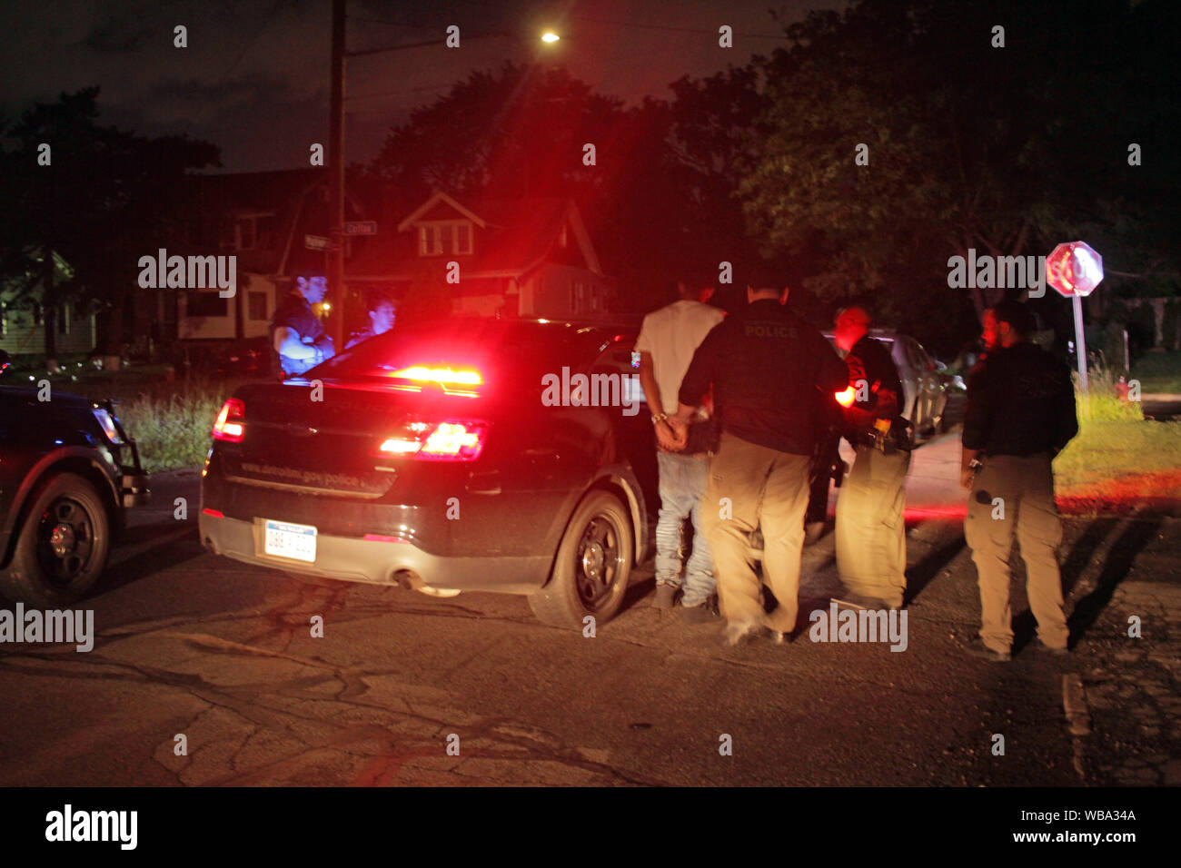 Detroit police arrest a man after finding a gun in his car, Detroit ...