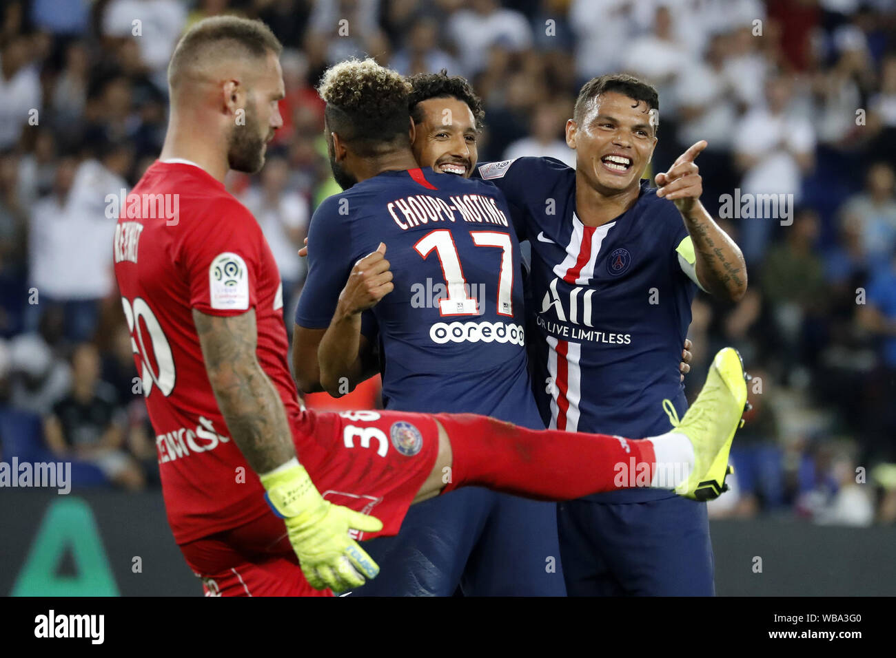 Paris, France. 25th Aug, 2019. Eric Choupo-Moting (2nd L) of Paris Saint-Germain celebrates his goal with teammates Marquinhos (2nd R) and Thiago Silva (1st R) during the Ligue 1 match between Paris Saint Germain and FC Toulouse at the Parc des Princes in Paris, France, on Aug. 25, 2019. Credit: Jack Chan/Xinhua Stock Photo