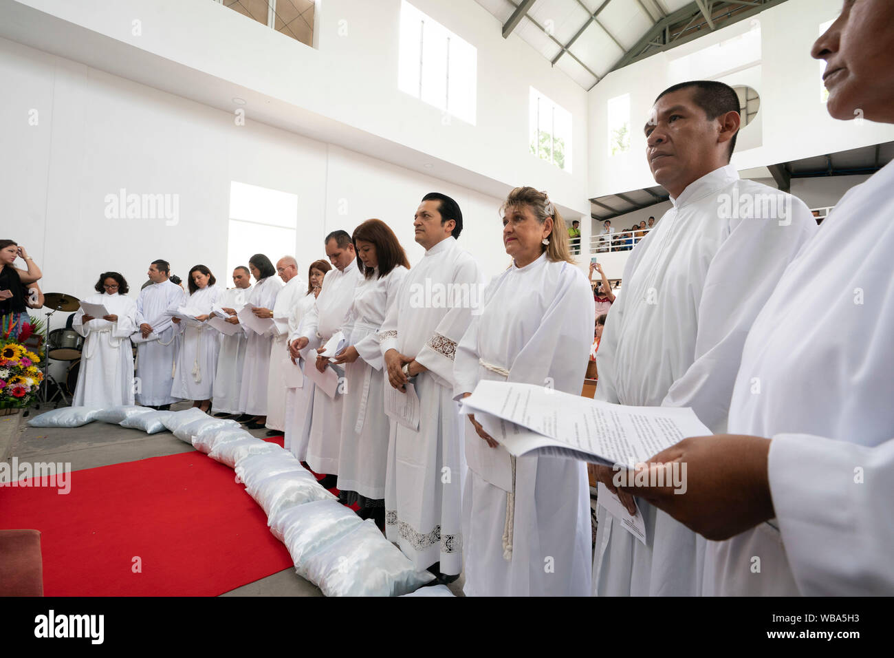 Central American male and female Lutheran seminarians await ordination during a ceremony at Resurrection Lutheran Church in San Salvador, El Salvador. Stock Photo