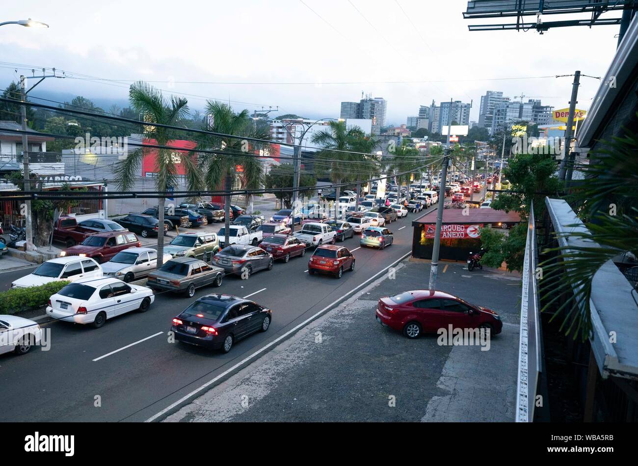 The busy street scene of La Zona Rosa in downtown San Salvador on the early evening of August 6, 2019. Stock Photo