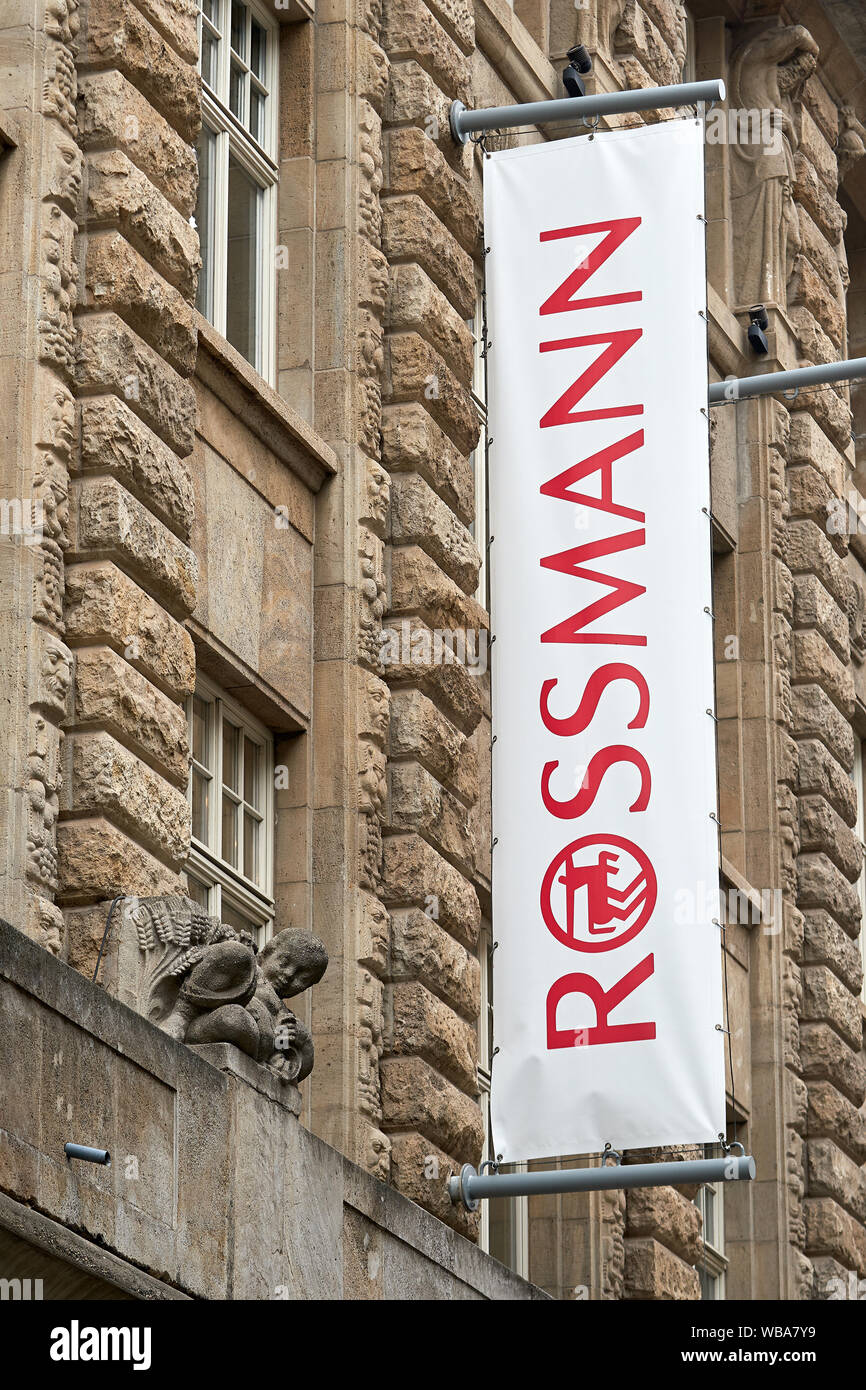 Flag at a Rossmann branch in downtown Leipzig. The entrepreneur Dirk Rossmann opened his first drugstore in Hanover in 1972 Stock Photo