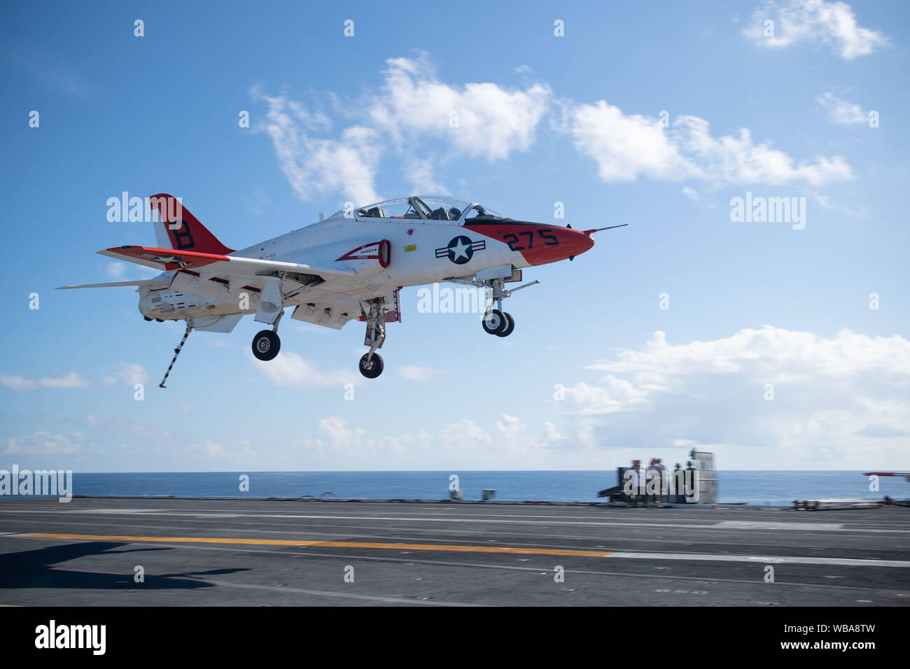 A T-45C Goshawk training aircraft, assigned to Training Air Wing (TW) 2, prepares to land on the flight deck of the aircraft carrier USS John C. Stennis (CVN 74) in the Atlantic Ocean, Aug. 23, 2019.  The John C. Stennis is underway conducting carrier qualifications in support of Chief of Naval Air Training Command. (U.S. Navy photo by Mass Communication Specialist 3rd Class Skyler Okerman) Stock Photo