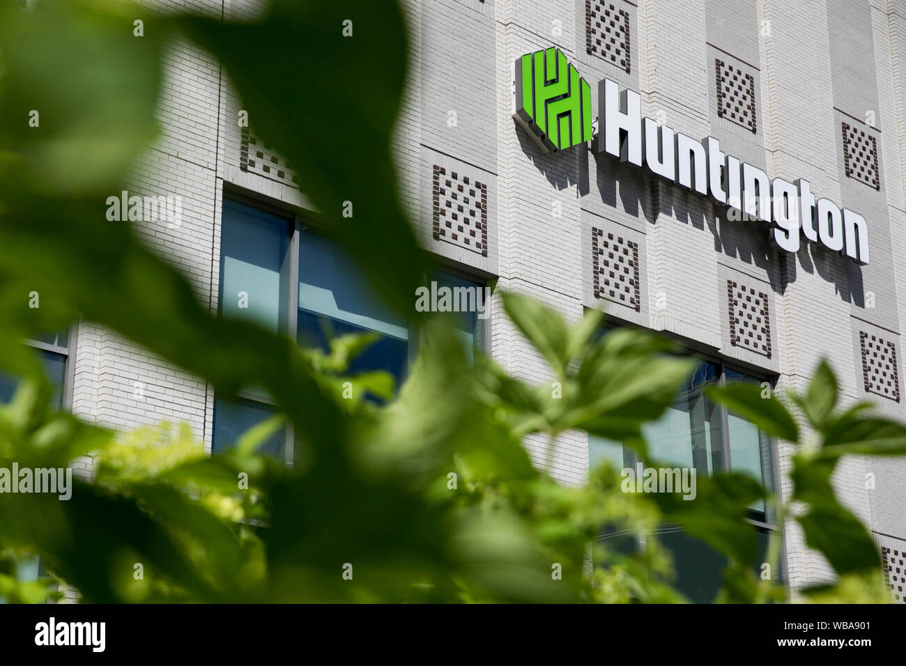 A logo sign outside of a facility occupied by Huntington Bank in Akron, Ohio on August 10, 2019. Stock Photo