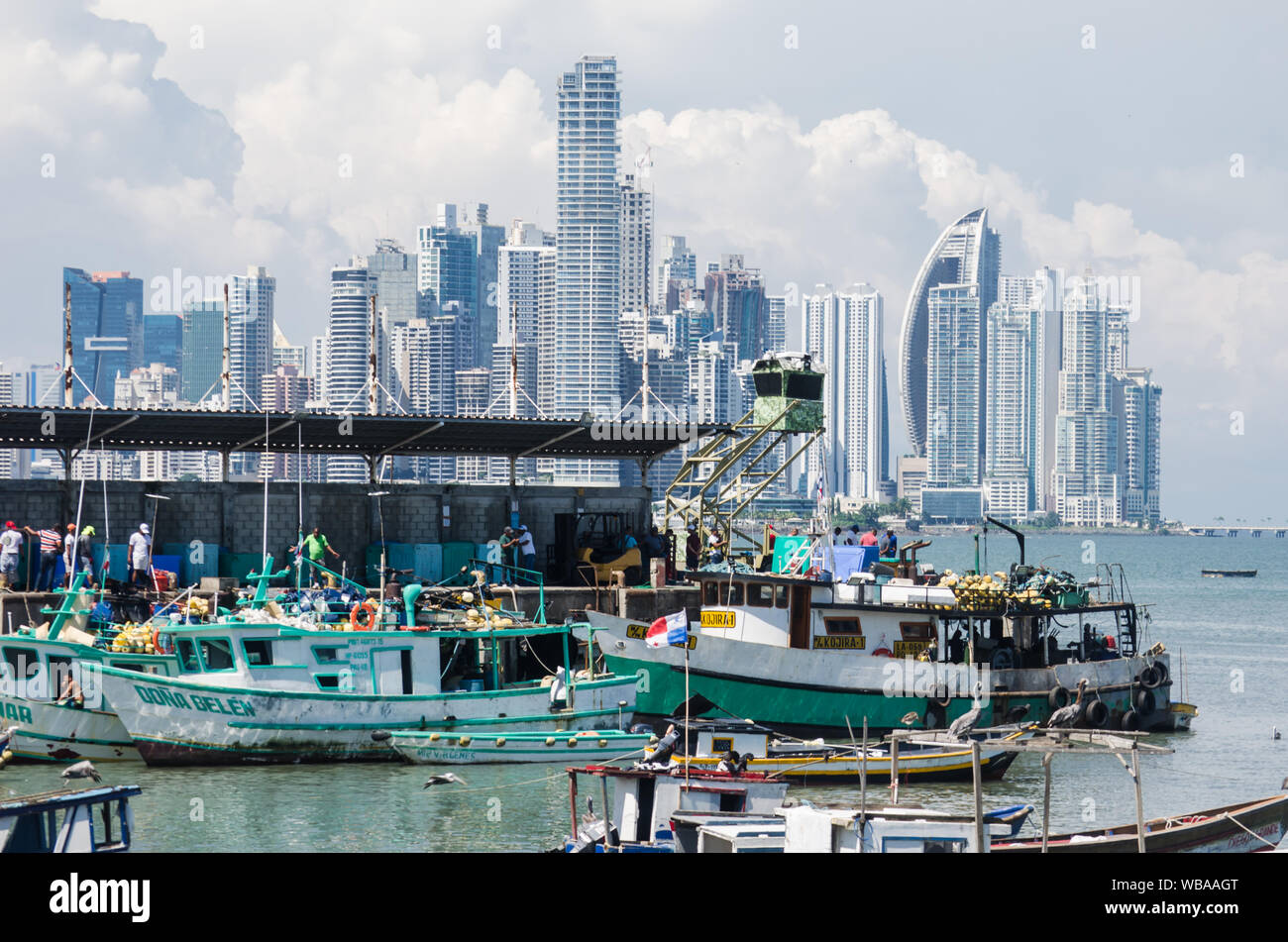 Scene of daily life in the public pier next to the Seafood Market in Panama City. Stock Photo