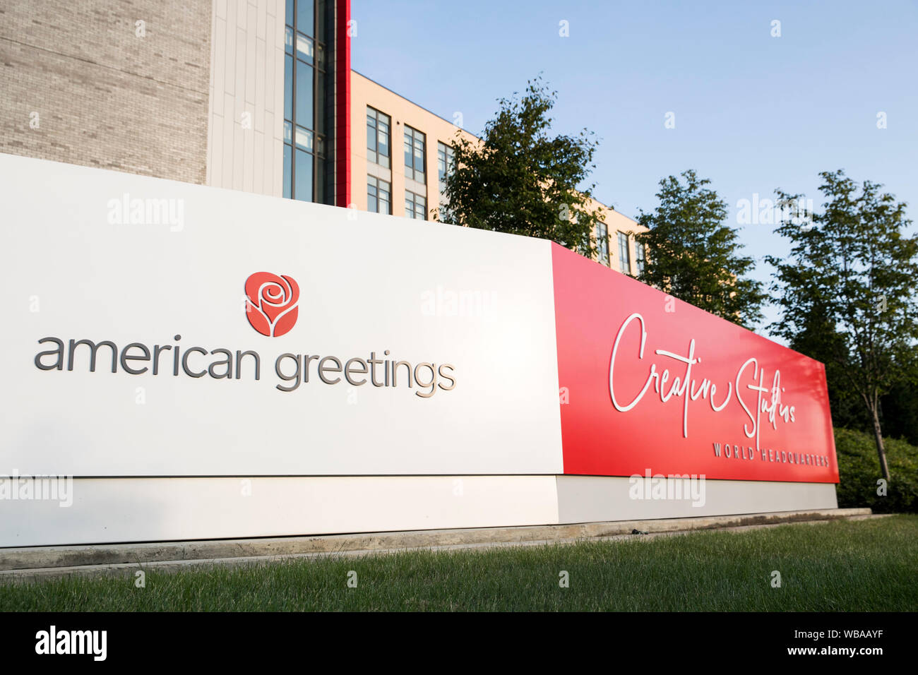 A logo sign outside of the headquarters of the American Greetings Corporation in Westlake, Ohio on August 11, 2019. Stock Photo