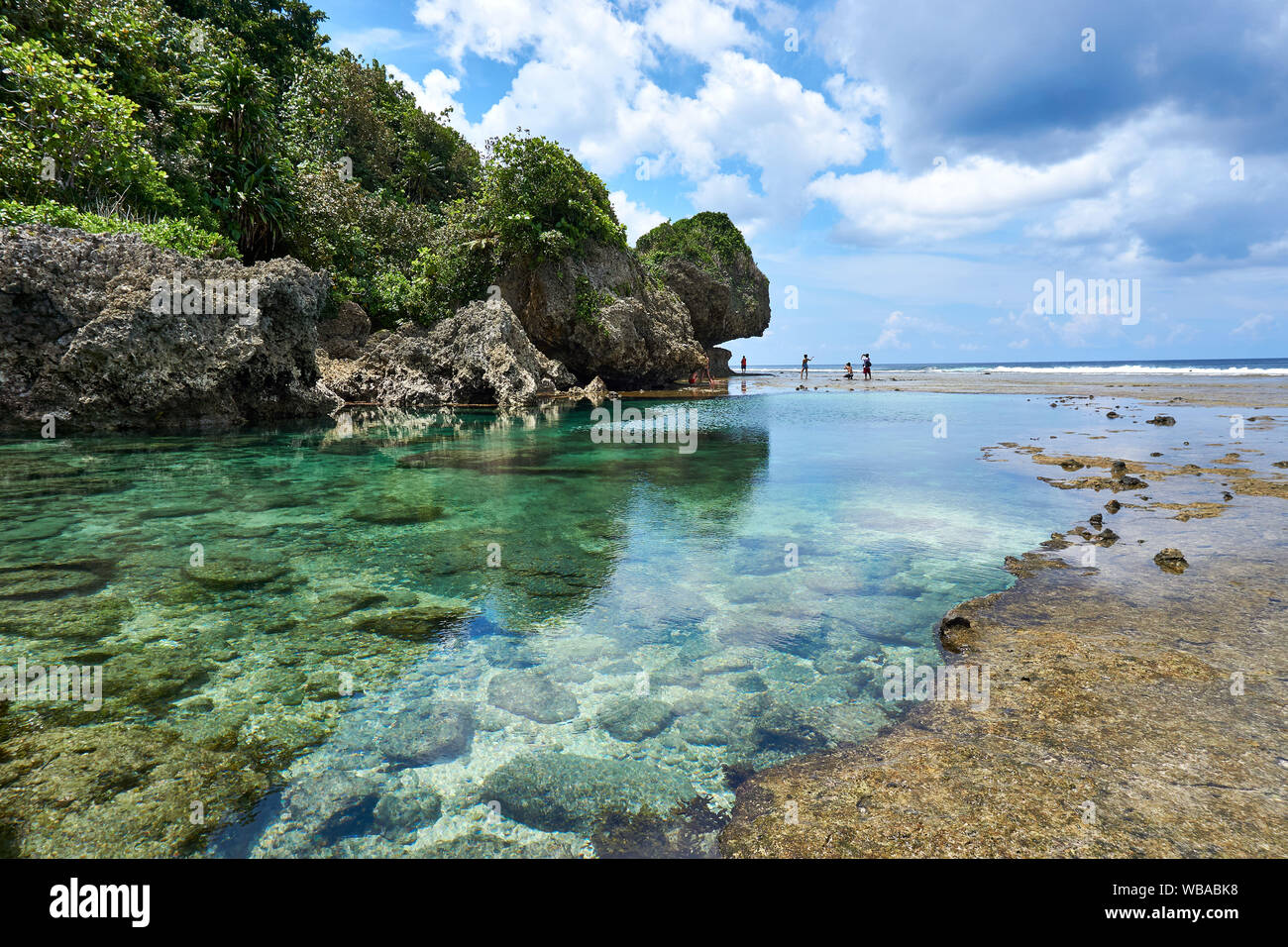 Philippines, Siargao Island, 22.July.2019. Tourists visit magpupungko natural rock pools in Siargao Philippines Stock Photo