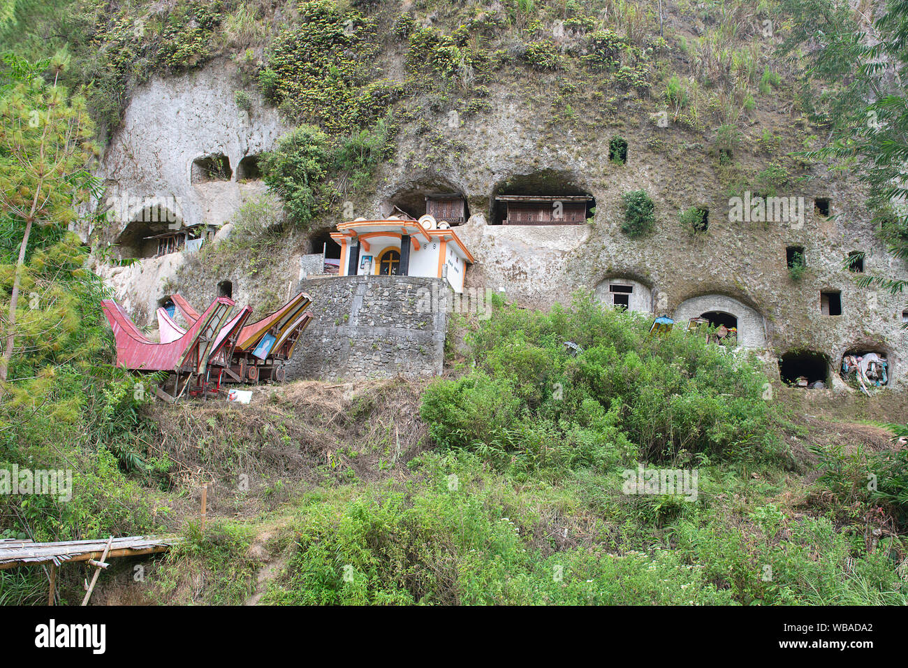 Cliffs burial site, traditional burial ground in Tana Toraja, worldwide unique ancestor cult of Sulawesi, Indonesia Stock Photo