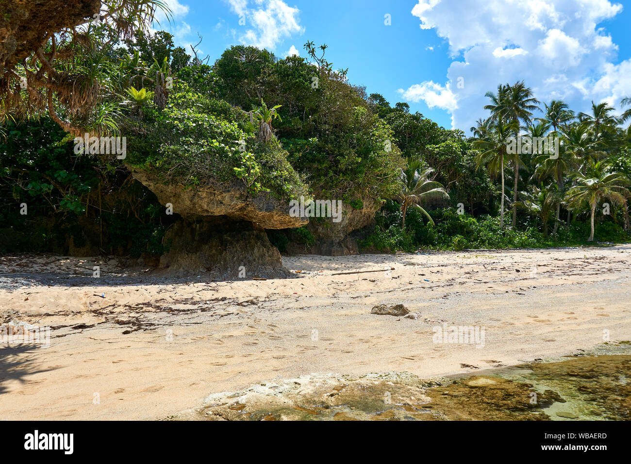 Philippines, Siargao Island, 22.July.2019. Tourists visit magpupungko natural rock pools in Siargao Philippines Stock Photo