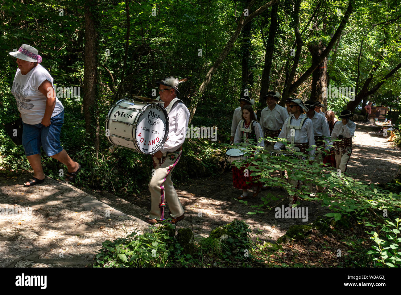 Participants of the Polish musical ensemble "Echo Gor" from Kasinka Mala in  the territory of the medieval Orthodox Christian cave monastery Stock Photo  - Alamy