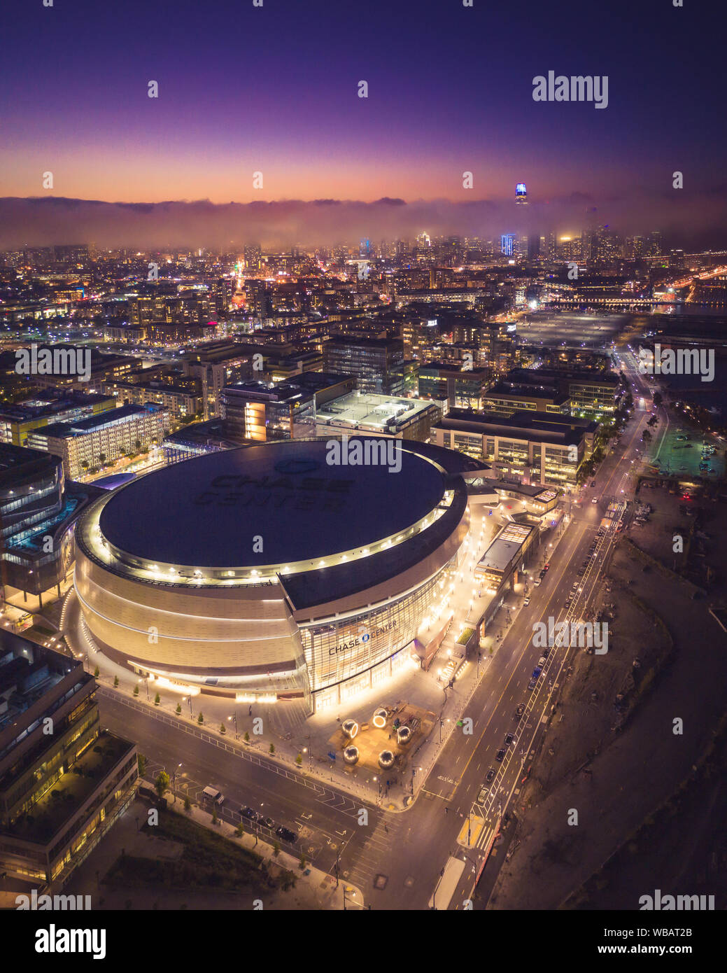 San Francisco, California / USA - August 24, 2019: Aerial View of the Chase Center Warriors Arena and the San Francisco Skyline at Night Stock Photo