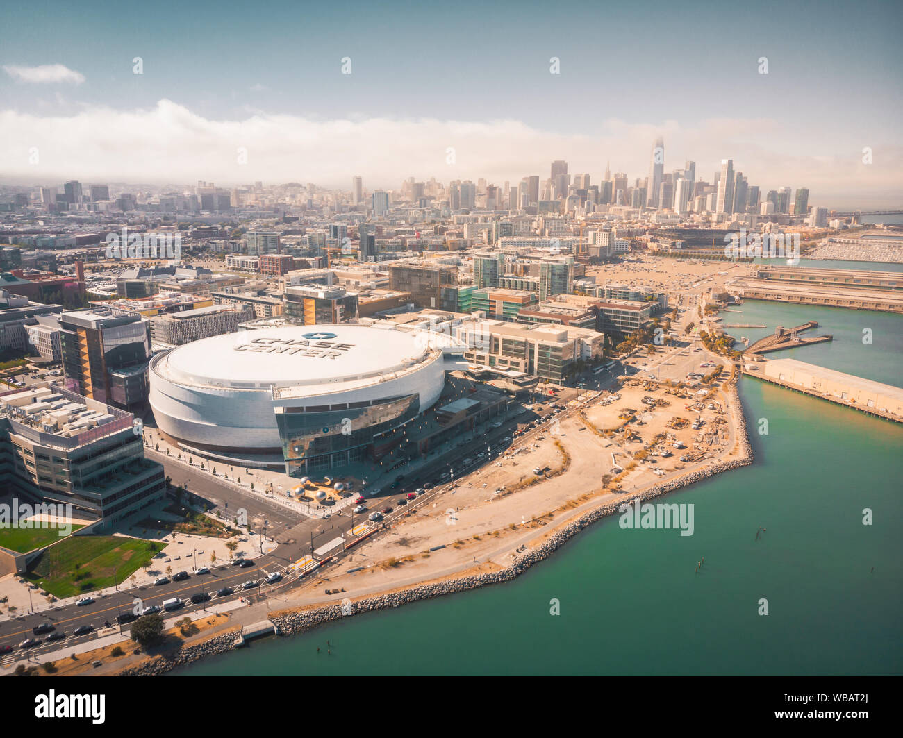 San Francisco, California / USA - August 23, 2019: Aerial View of the Chase Center Warriors Arena and the San Francisco Skyline Stock Photo