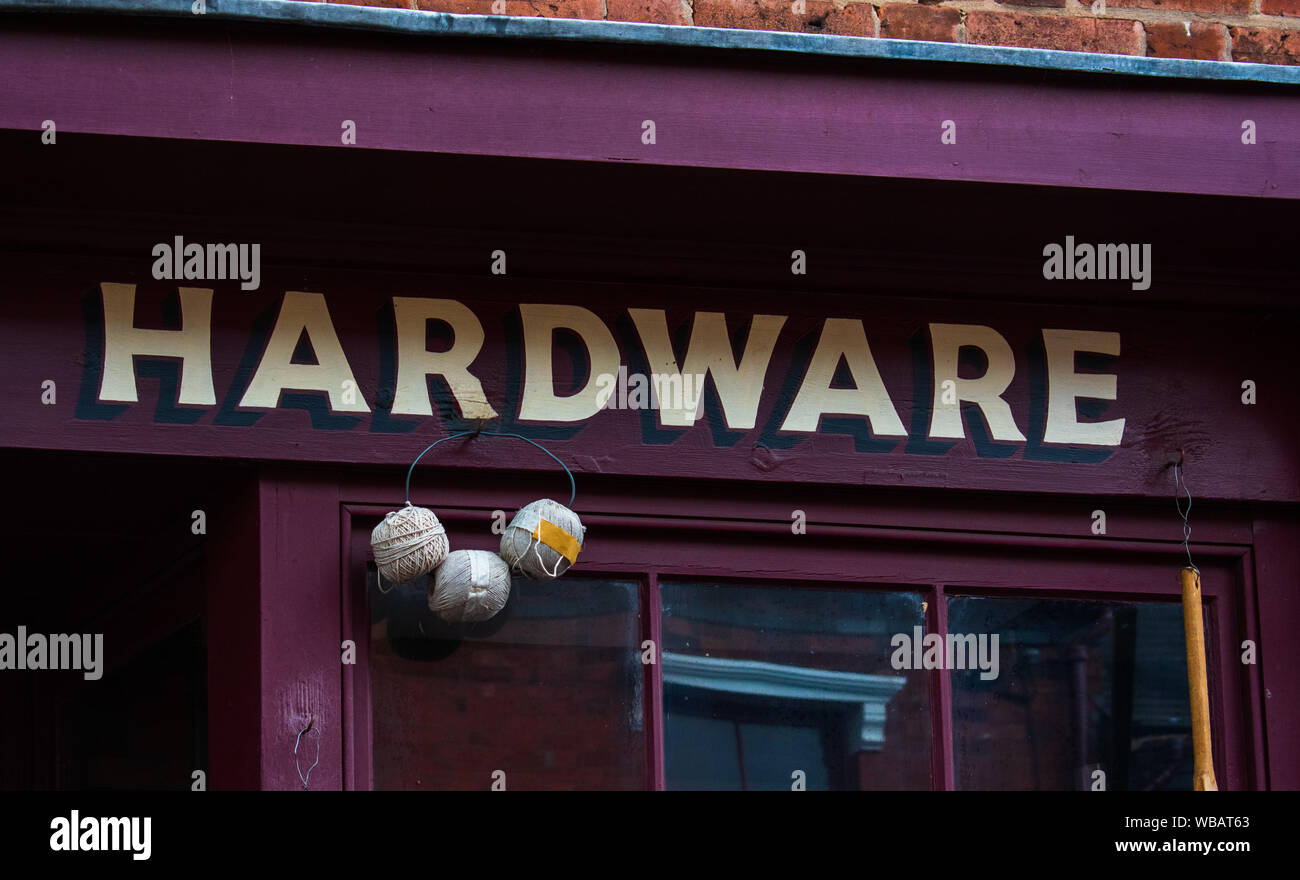 Signage above the door of a hardware store Stock Photo