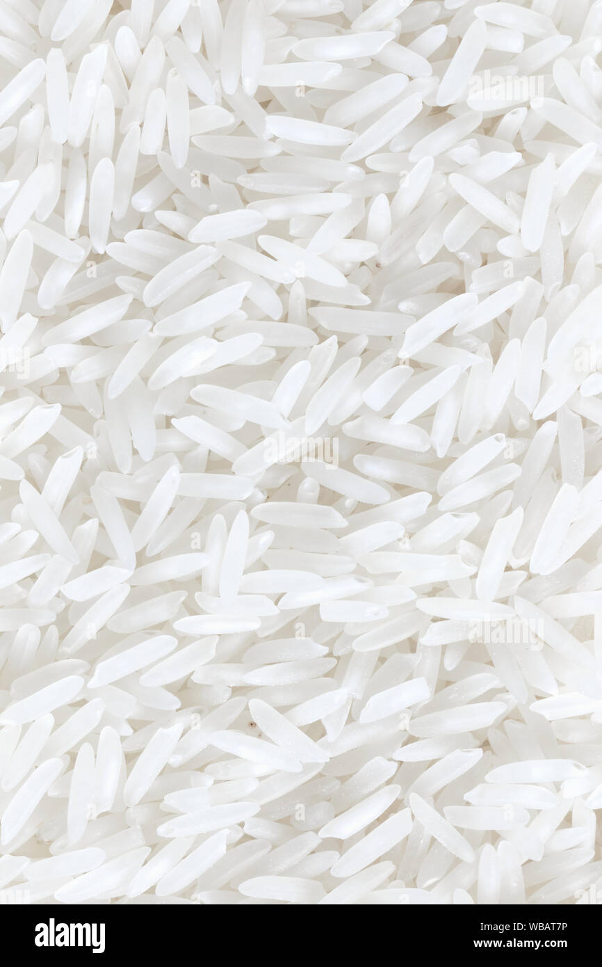 Background made of rice, selective focus. Stock Photo