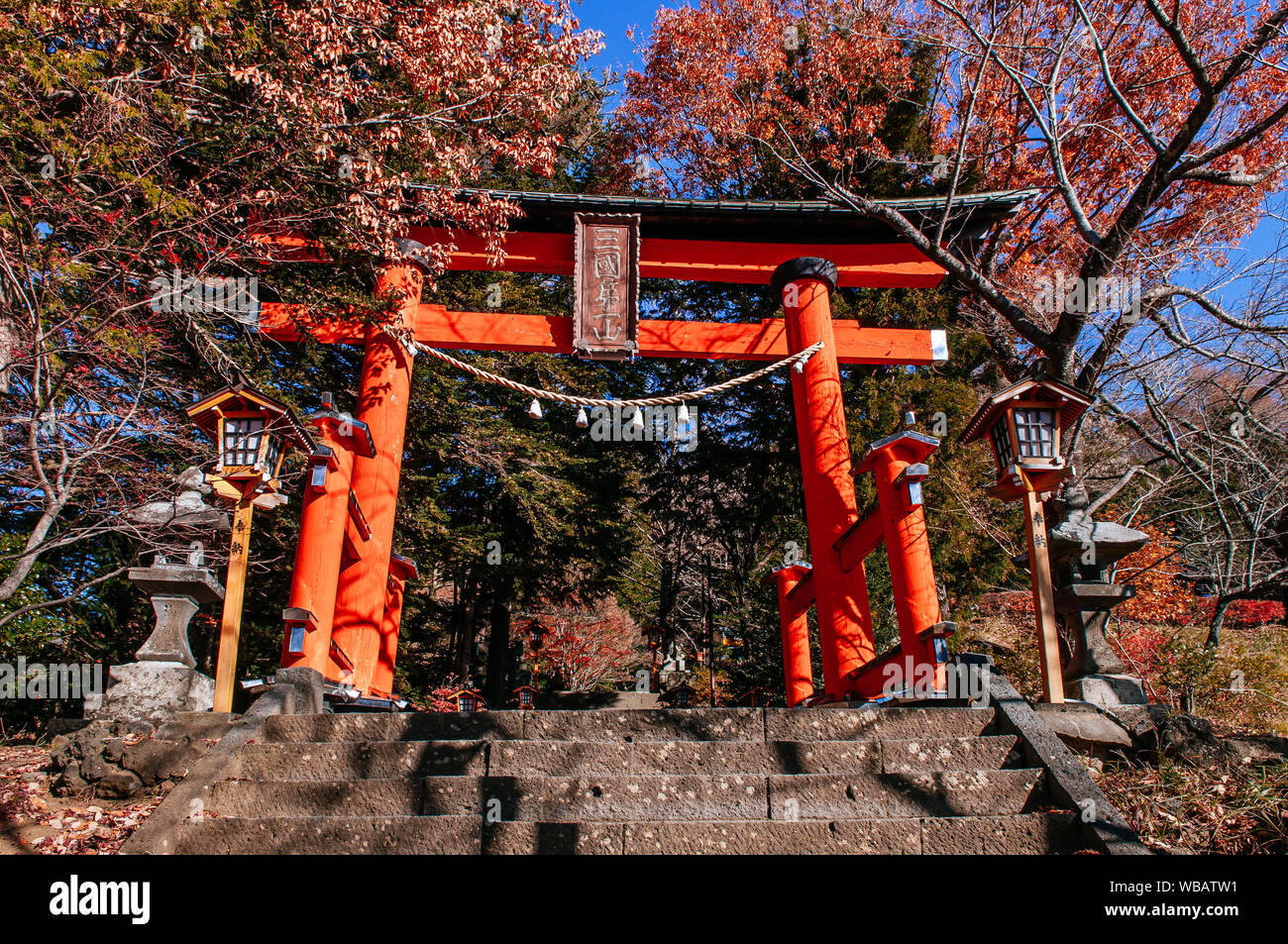 Red Torii gate of Chureito Pagoda Shrine entrance with stone steps under autumn maple tree Shimoyoshida - Arakurayama Sengen Park in Fujiyoshida near Stock Photo