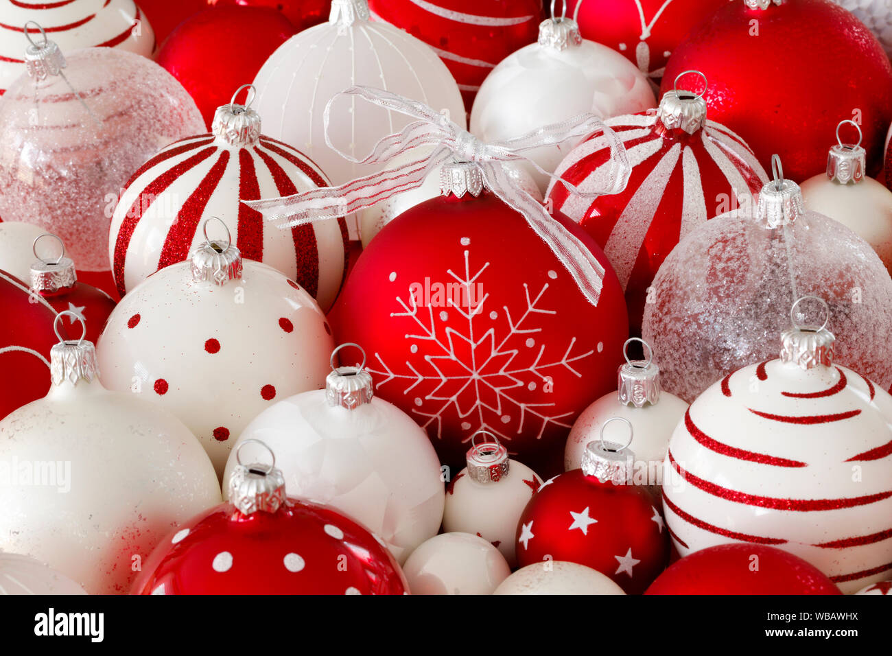 White and red Christmas baubles. Studio picture. Switzerland Stock Photo