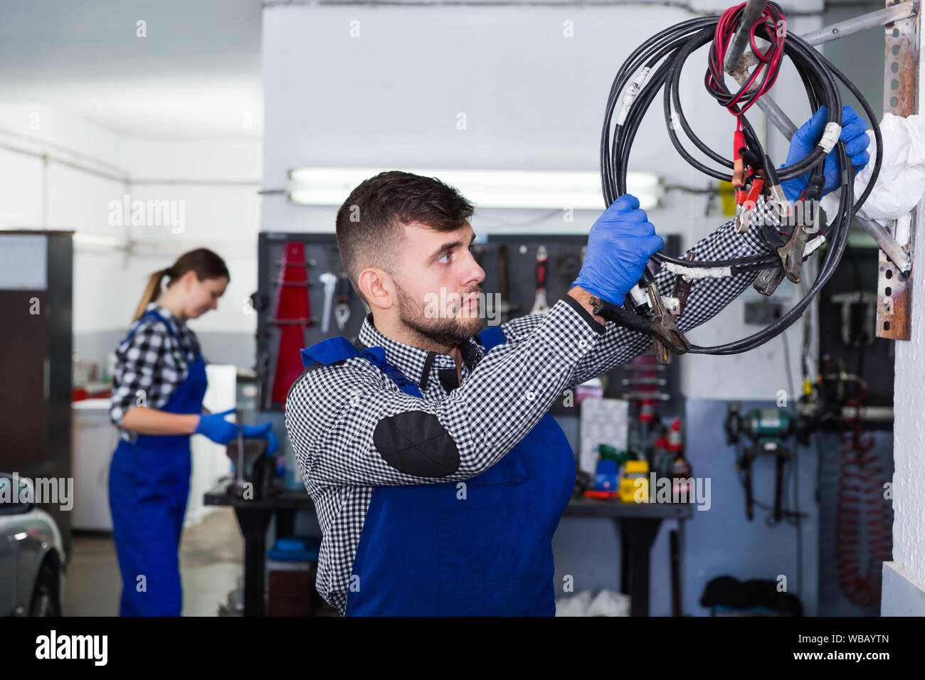 Male worker choosing instruments hi-res stock photography and images ...