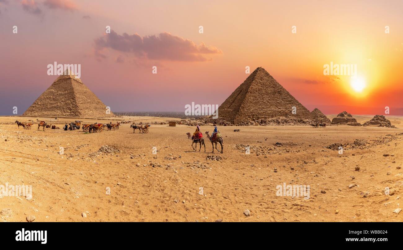 Sunset panorama of the Great Pyramids of Giza, Egypt. Stock Photo