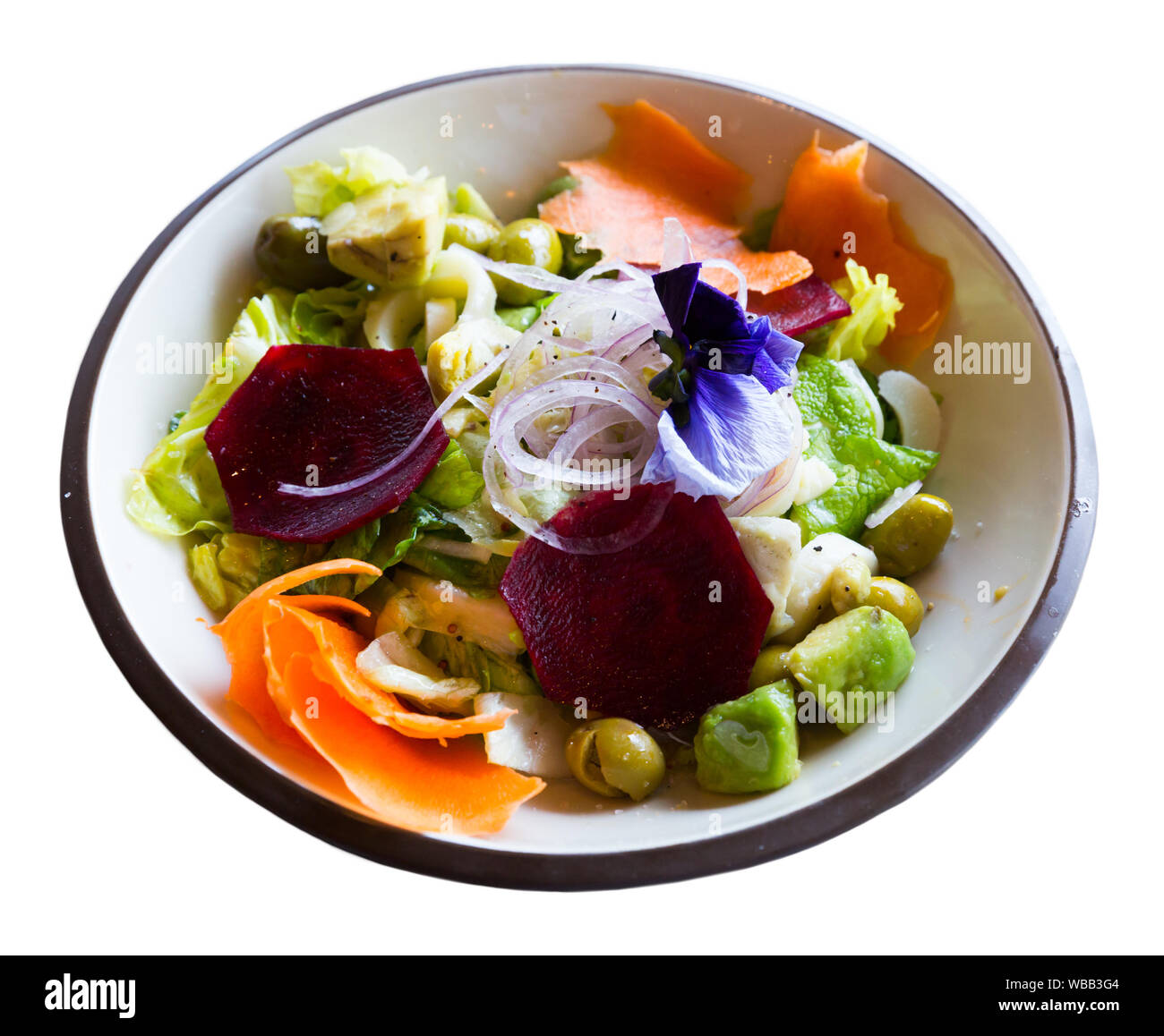 Appetizing salad with endive, palms hearts, avocado and radish