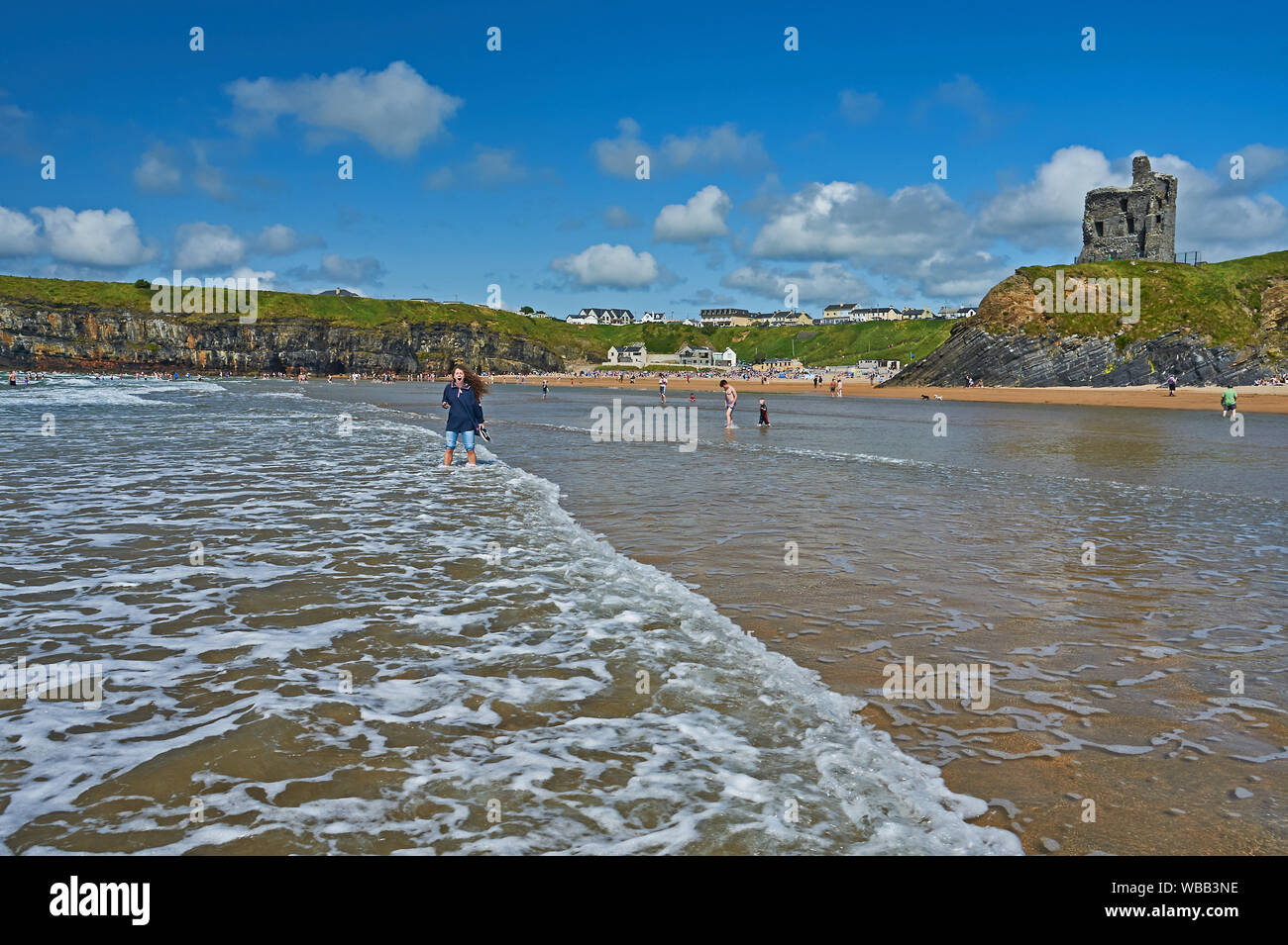 Ballybunion, County Kerry, Eire and the sandy beach is overlooked by the remains of Ballybunion Castle Stock Photo