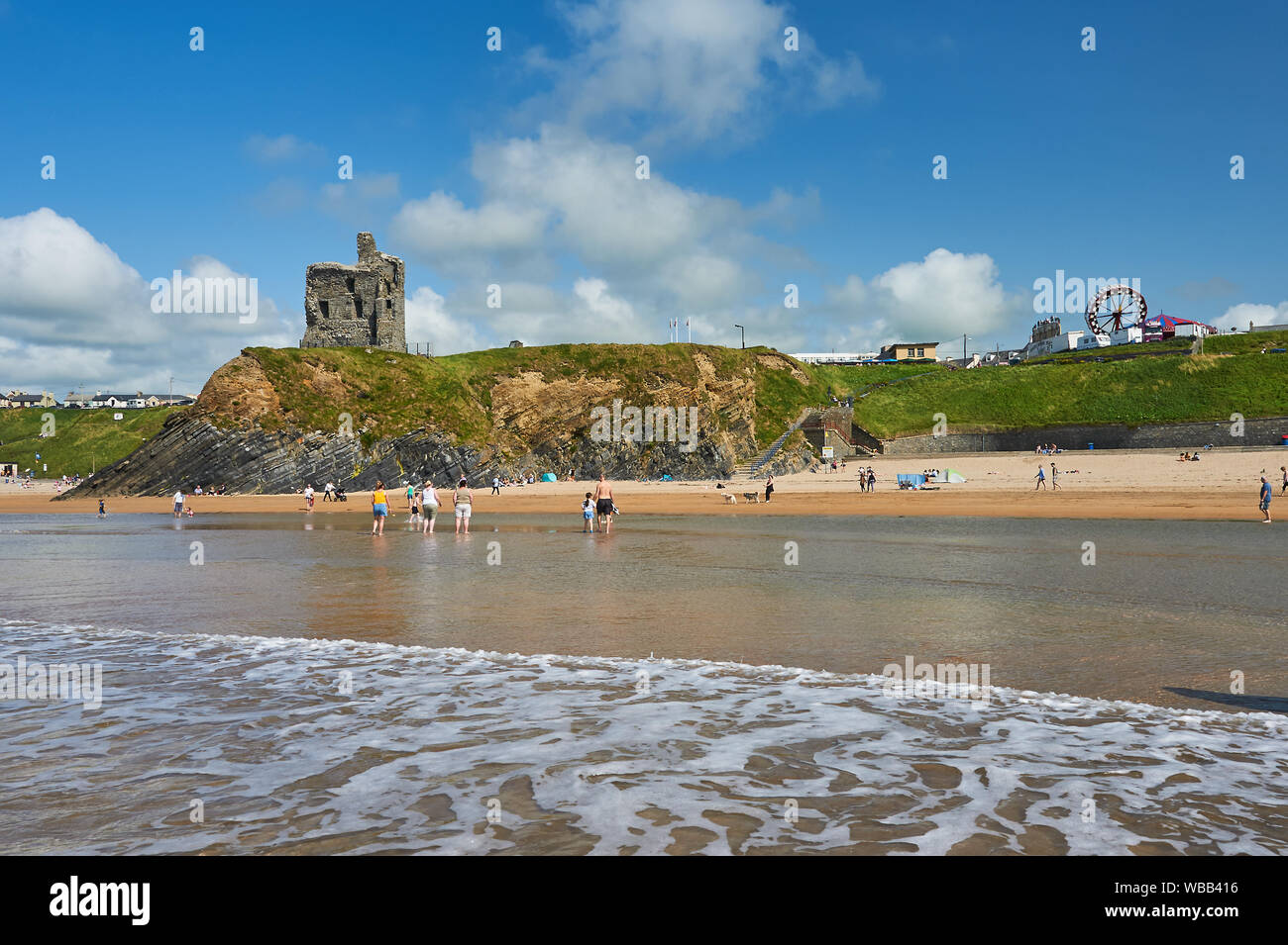 Ballybunion, County Kerry, Eire and the sandy beach is overlooked by the remains of Ballybunion Castle Stock Photo