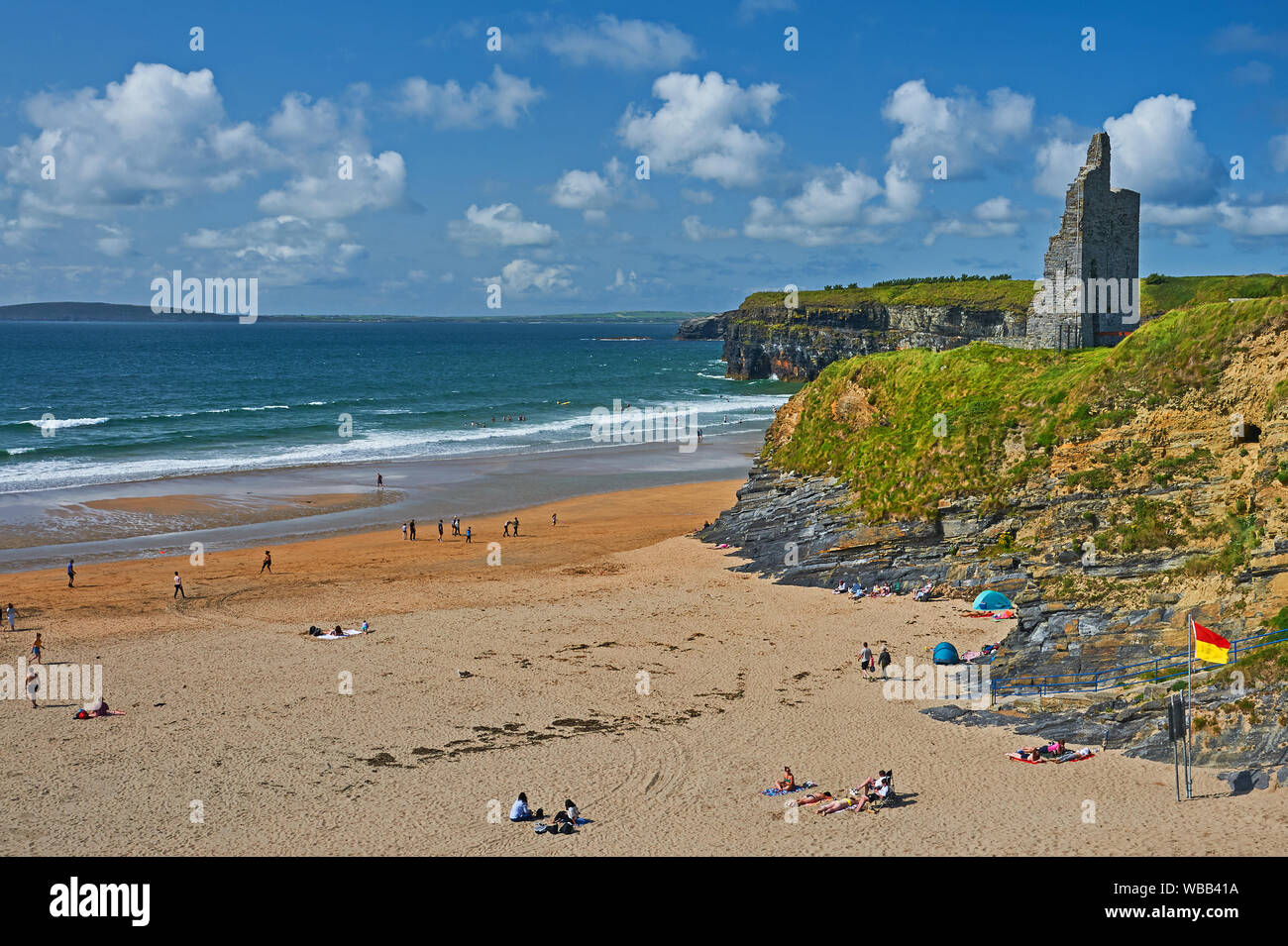 Ballybunion, County Kerry, Eire and the sandy beach is overlooked by the remains of Ballybunion Castle Stock Photo