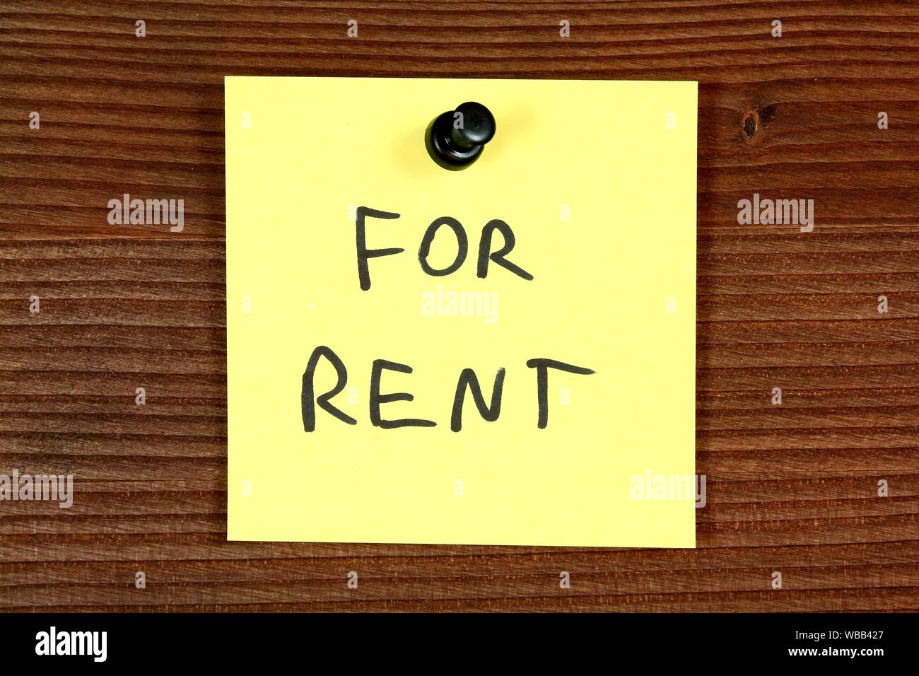 Sticky note with rental message for rent. Real estate concept