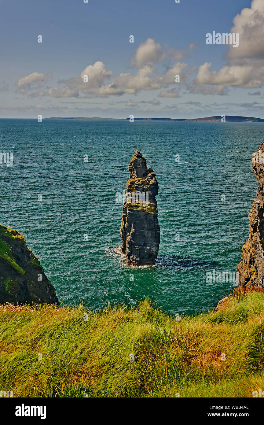 Sea stack at Bromore Cliffs, County Kerry, Republic of Ireland are a result of centuries of coastal erosion by the Atlantic Ocean. Stock Photo
