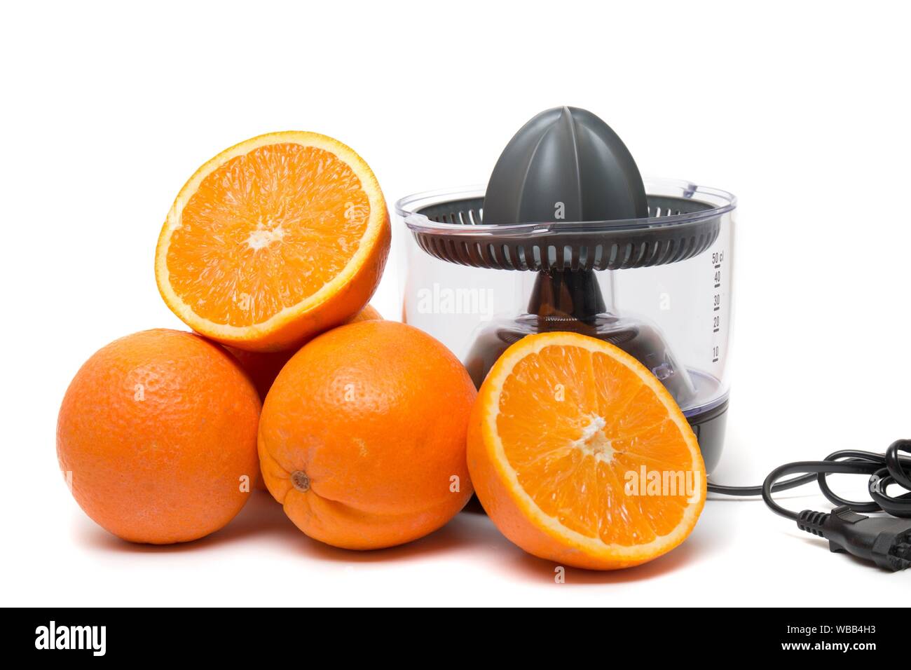 Automatic orange juicer machine isolated on a white background Stock