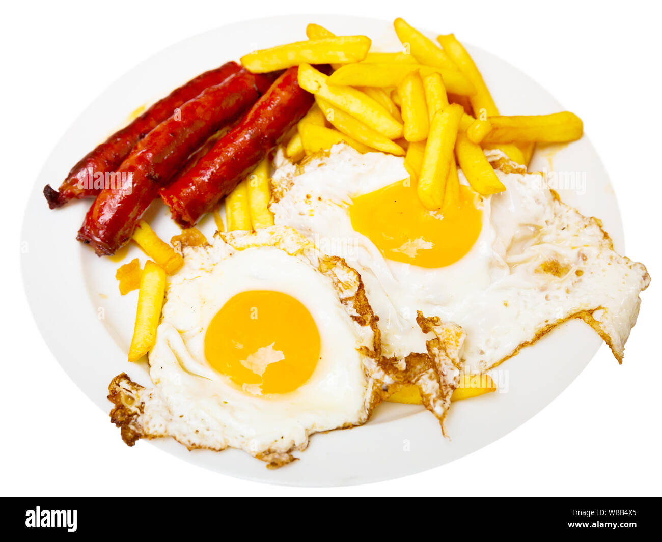 Huevos con chistorra. Scrambled eggs with sausage and potatoes. Spanish cuisine. Isolated over white background Stock Photo