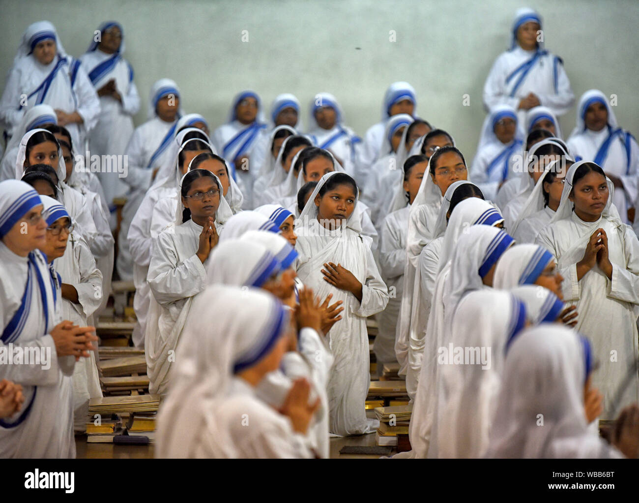 Kolkata, India. 26th Aug, 2019. Christian Nuns offer their love and prayers on the eve of Mother Teresa's 110th birthday at Missionaries of Charity in Kolkata.Mother Teresa, known in the Catholic Church as Saint Teresa of Calcutta, devoted her life to caring for the sick and poor lives throughout the world & canonised by the Roman Catholic Church as Saint Teresa. Credit: SOPA Images Limited/Alamy Live News Stock Photo