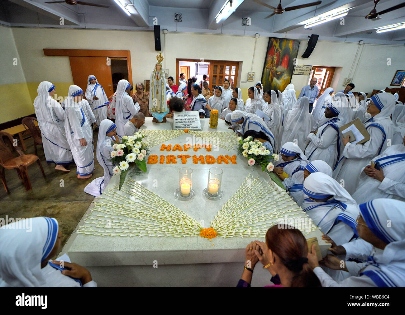 Kolkata, India. 26th Aug, 2019. Christian Nuns offer their love and prayers on the eve of Mother Teresa's 110th birthday at Missionaries of Charity in Kolkata.Mother Teresa, known in the Catholic Church as Saint Teresa of Calcutta, devoted her life to caring for the sick and poor lives throughout the world & canonised by the Roman Catholic Church as Saint Teresa. Credit: SOPA Images Limited/Alamy Live News Stock Photo