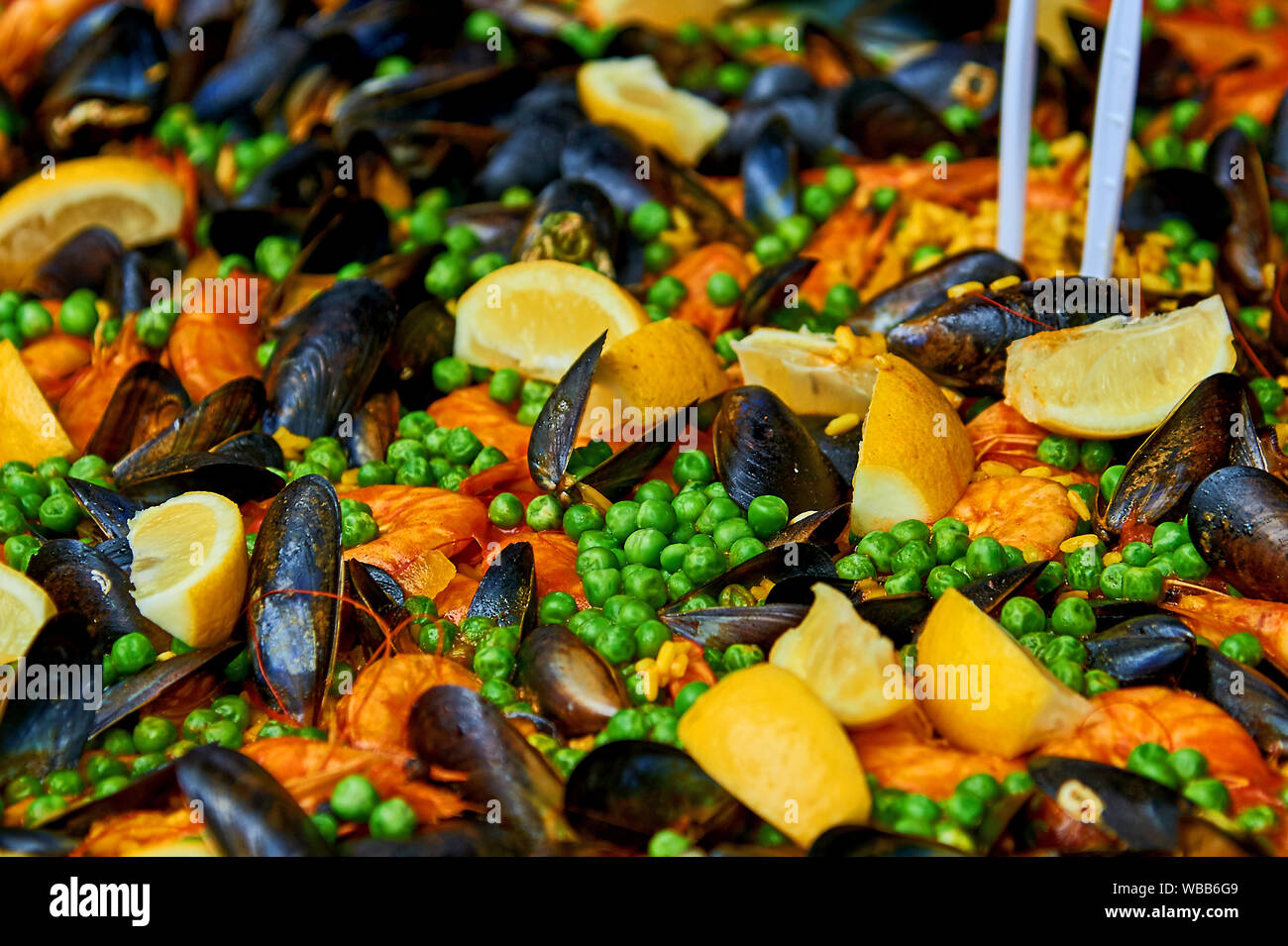 Enormous Batch Of Paella Being Cooked In The Extra Large Wok For