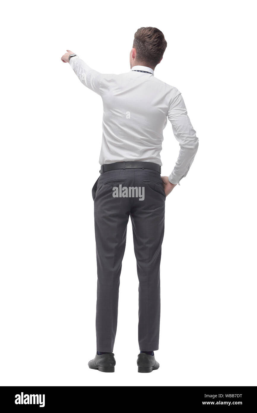 rear view.smiling young businessman pointing at white screen Stock ...