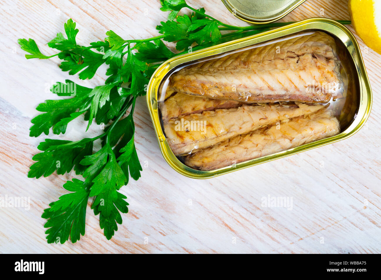 Picture of tasty fillet of mackerel  in sunflower oil in open tin can Stock Photo