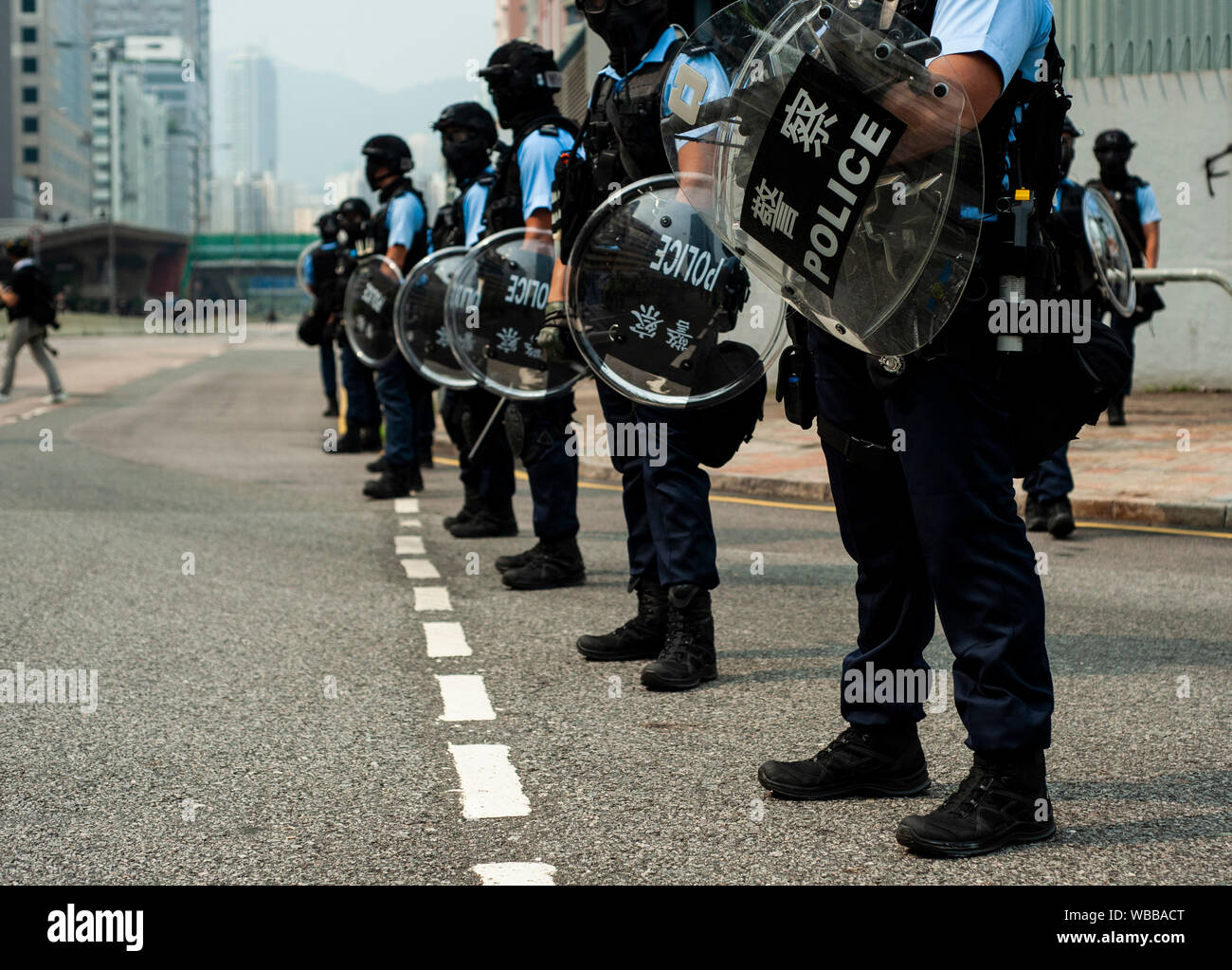 Hong Kong, China. 24th Aug, 2019. Riot police officers stand on guard during the protest in Kwun Tong.Mass demonstrations continues for one more weekend in Hong Kong which began in June 2019 over a now-suspended extradition bill to China. Credit: SOPA Images Limited/Alamy Live News Stock Photo