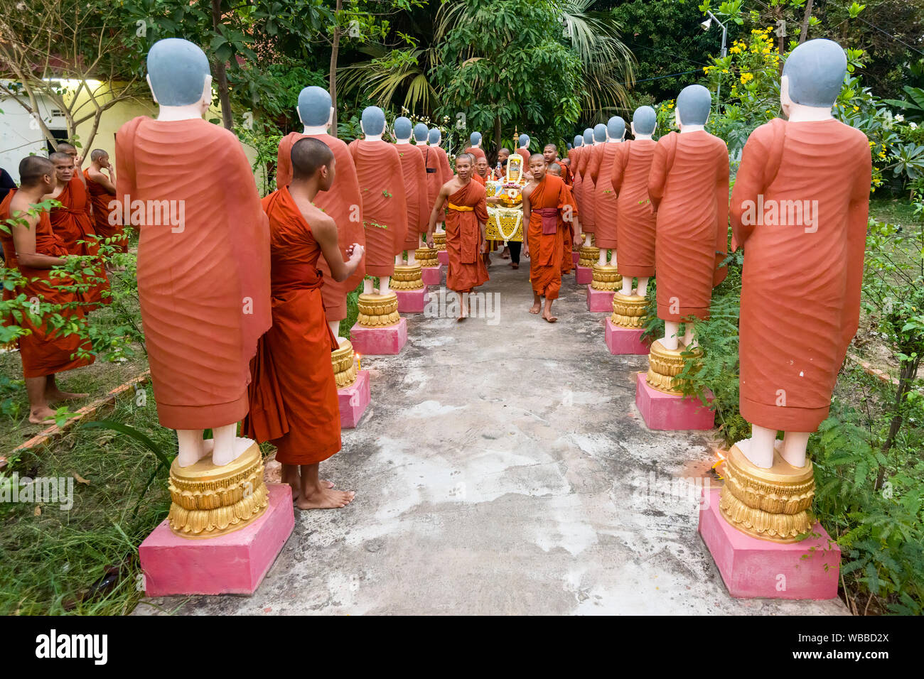 Rows Of Stone Monks Statues At Wat Bo Temple During Meak Bochea