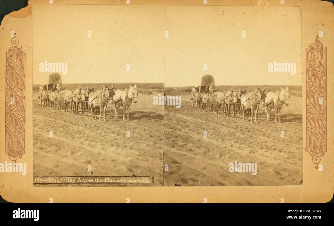 Emigrating across the plains of America. Additional title: Descriptive views of the American continent, 157. Continent Stereoscopic Company Stock Photo