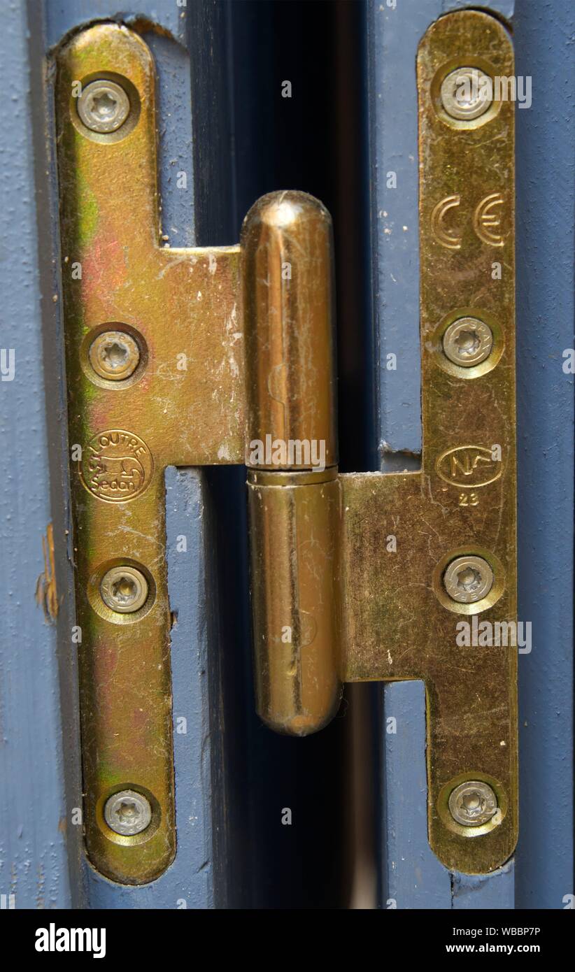brass door hinge, Forcalquier, Provence, France Stock Photo Alamy