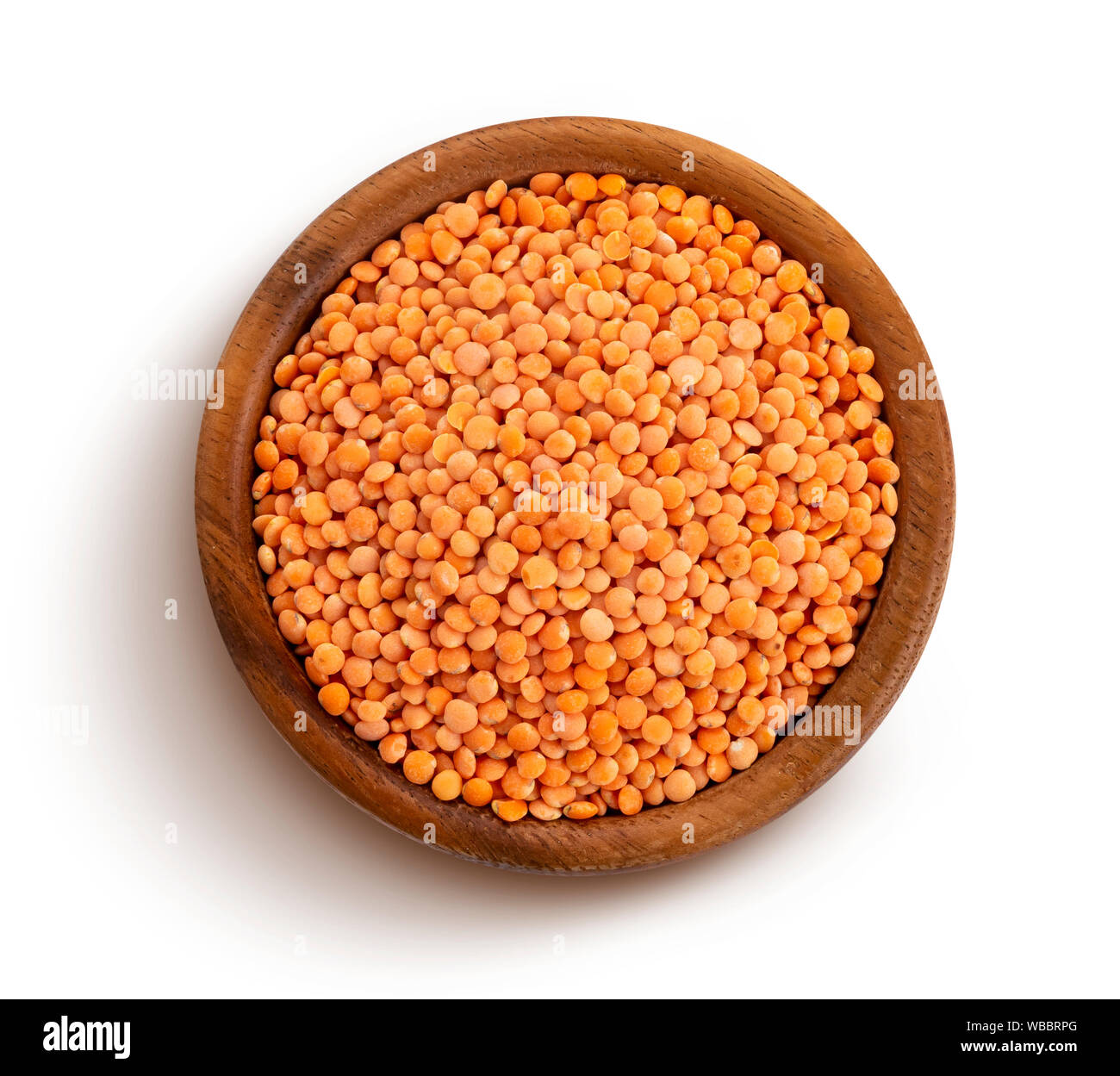 Red lentils isolated on white background, top view Stock Photo - Alamy