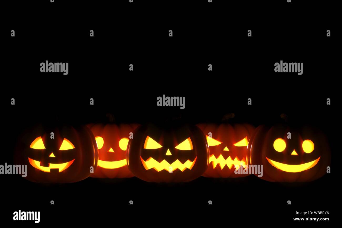 Group of Halloween Jack o Lanterns on black background. 3D Rendering ...