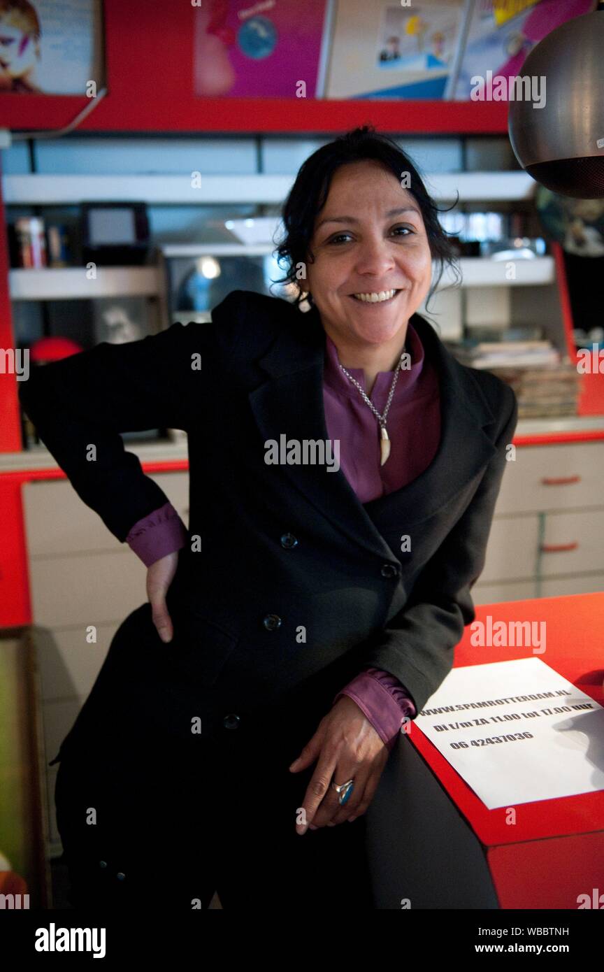 Rotterdam, Netherlands. Young and attractive Caribbean woman behind the