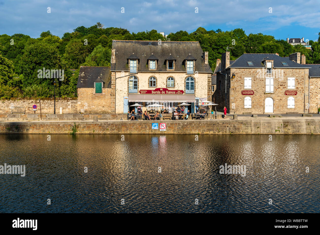 Dinan, France - July 23, 2018: View of a typical restaurant in the port ...