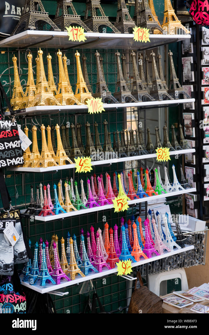 Cheap and colourful Eiffel Tower gifts for sale for tourists ...